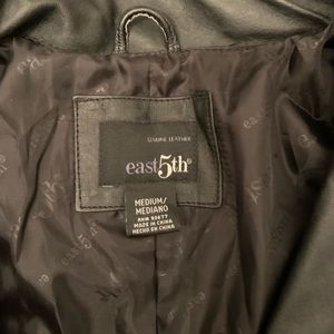 Woman’s genuine leather jacket size medium, black. Two front pockets.